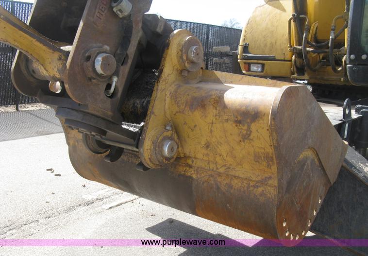 image for item J2903 Caterpillar M318C rubber tire excavator