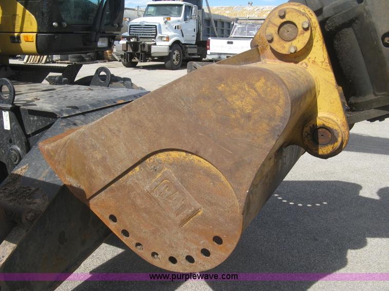 image for item J2903 Caterpillar M318C rubber tire excavator