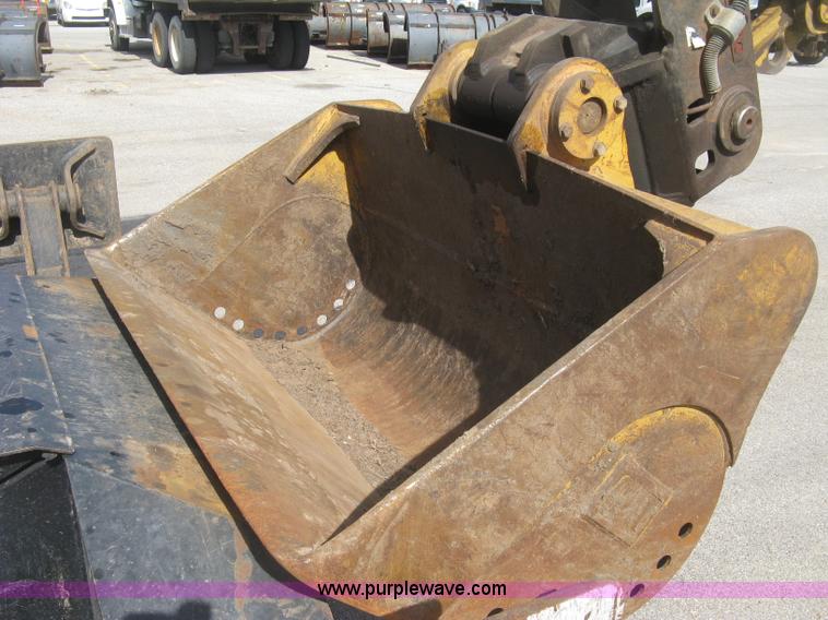 image for item J2903 Caterpillar M318C rubber tire excavator