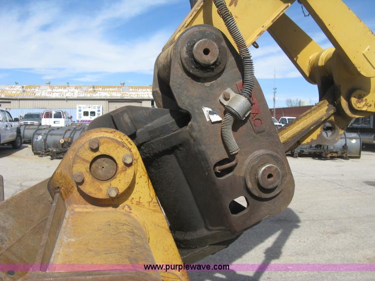 image for item J2903 Caterpillar M318C rubber tire excavator