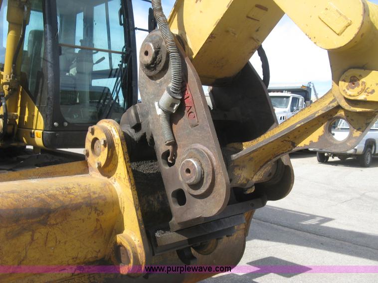 image for item J2903 Caterpillar M318C rubber tire excavator