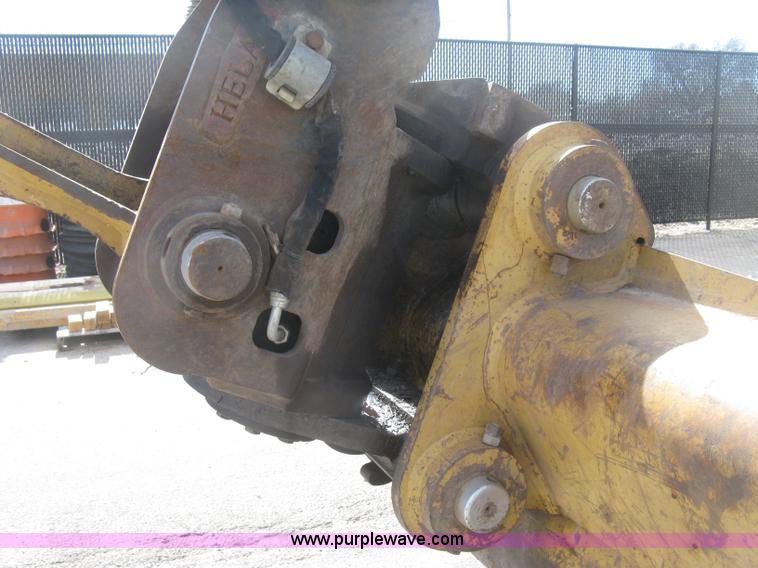 image for item J2903 Caterpillar M318C rubber tire excavator