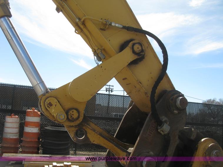 image for item J2903 Caterpillar M318C rubber tire excavator