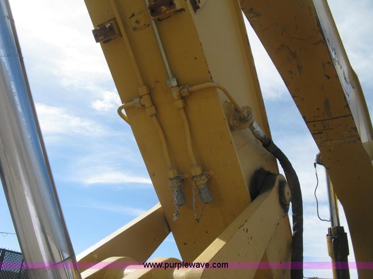 image for item J2903 Caterpillar M318C rubber tire excavator