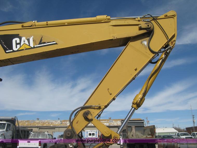 image for item J2903 Caterpillar M318C rubber tire excavator