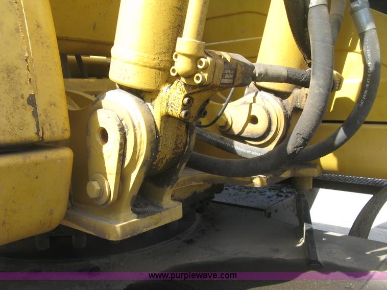 image for item J2903 Caterpillar M318C rubber tire excavator