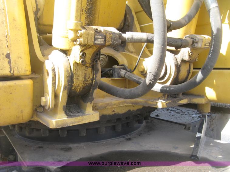 image for item J2903 Caterpillar M318C rubber tire excavator