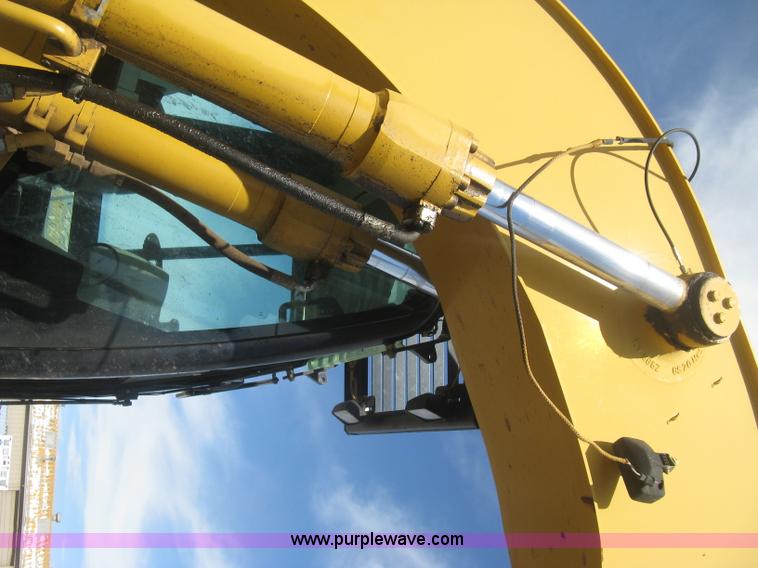 image for item J2903 Caterpillar M318C rubber tire excavator