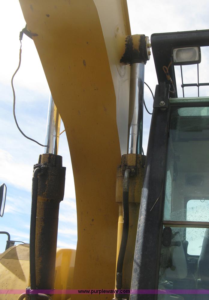 image for item J2903 Caterpillar M318C rubber tire excavator