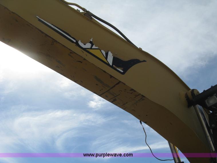 image for item J2903 Caterpillar M318C rubber tire excavator