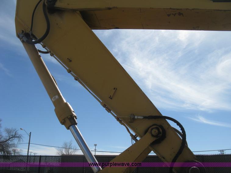 image for item J2903 Caterpillar M318C rubber tire excavator