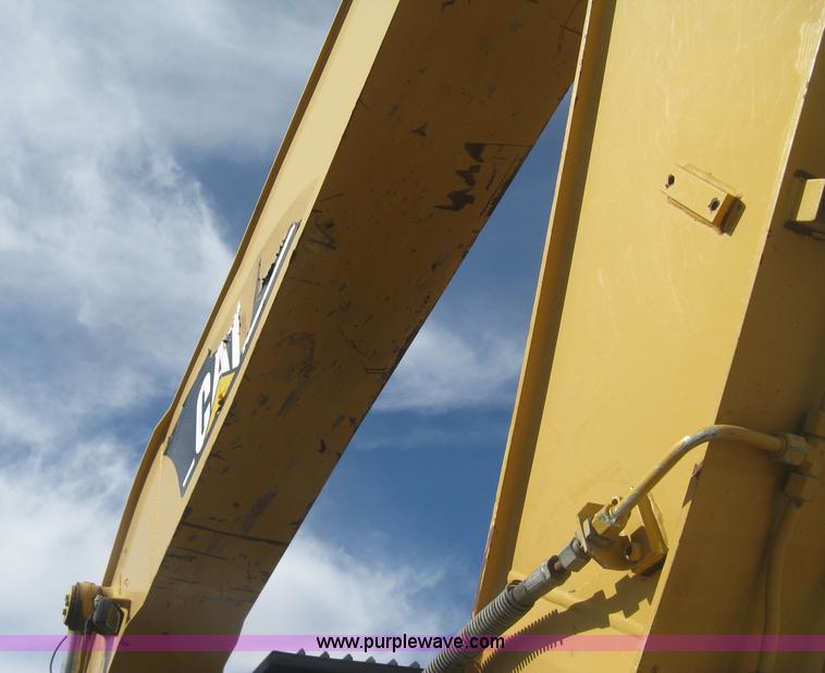 image for item J2903 Caterpillar M318C rubber tire excavator