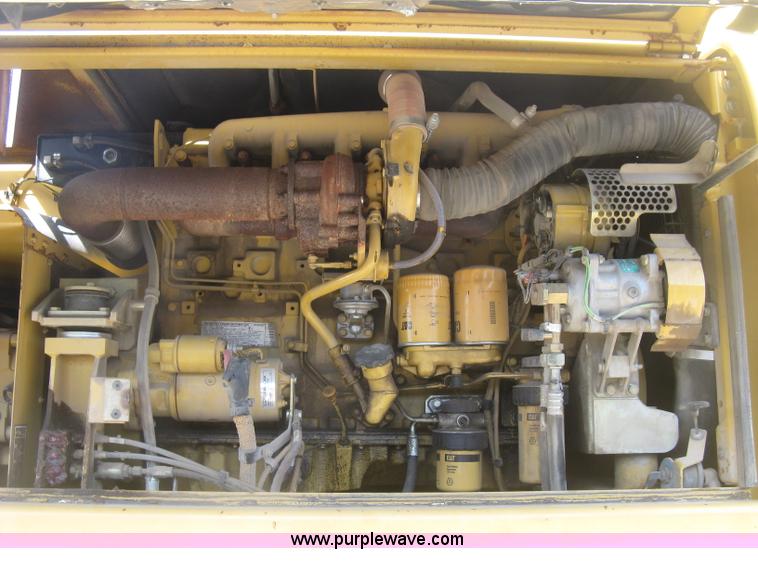 image for item J2903 Caterpillar M318C rubber tire excavator