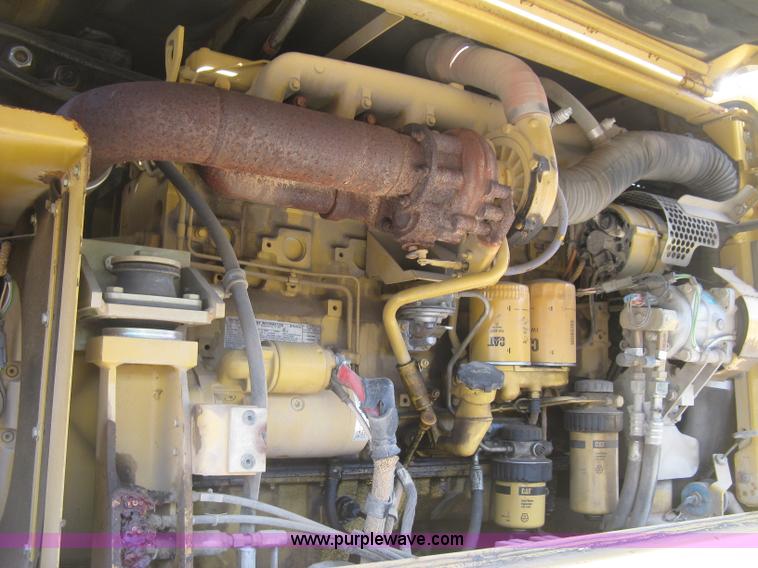 image for item J2903 Caterpillar M318C rubber tire excavator