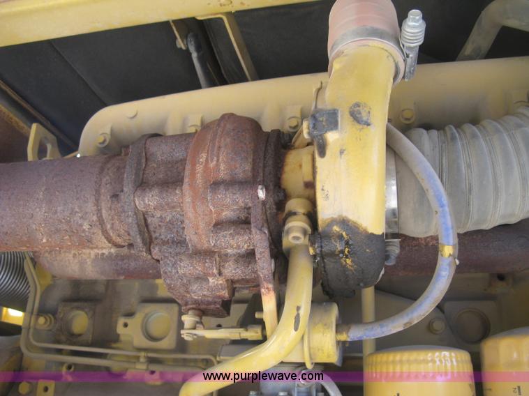 image for item J2903 Caterpillar M318C rubber tire excavator