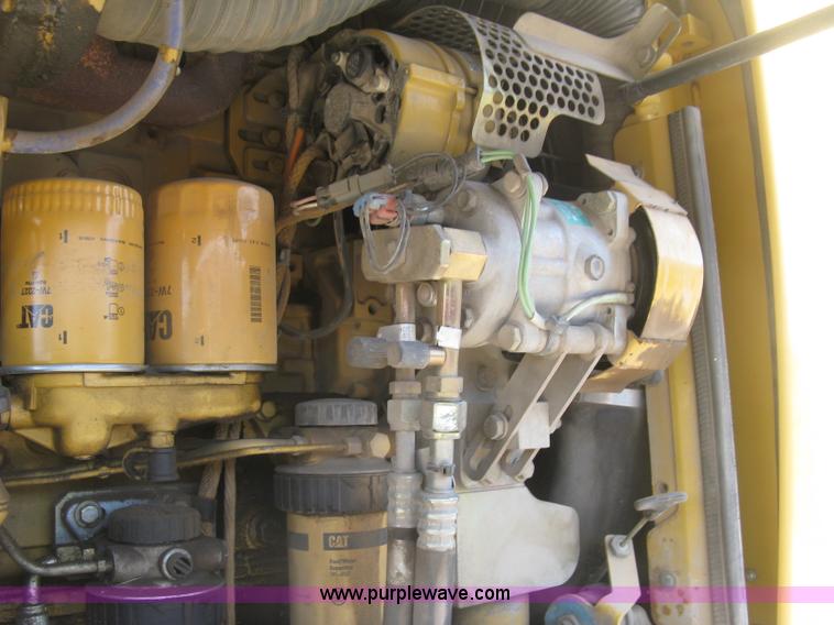 image for item J2903 Caterpillar M318C rubber tire excavator