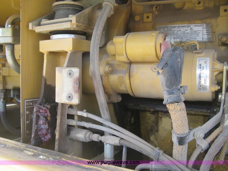 image for item J2903 Caterpillar M318C rubber tire excavator