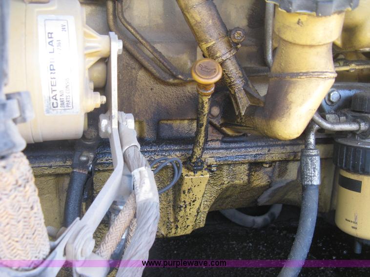 image for item J2903 Caterpillar M318C rubber tire excavator