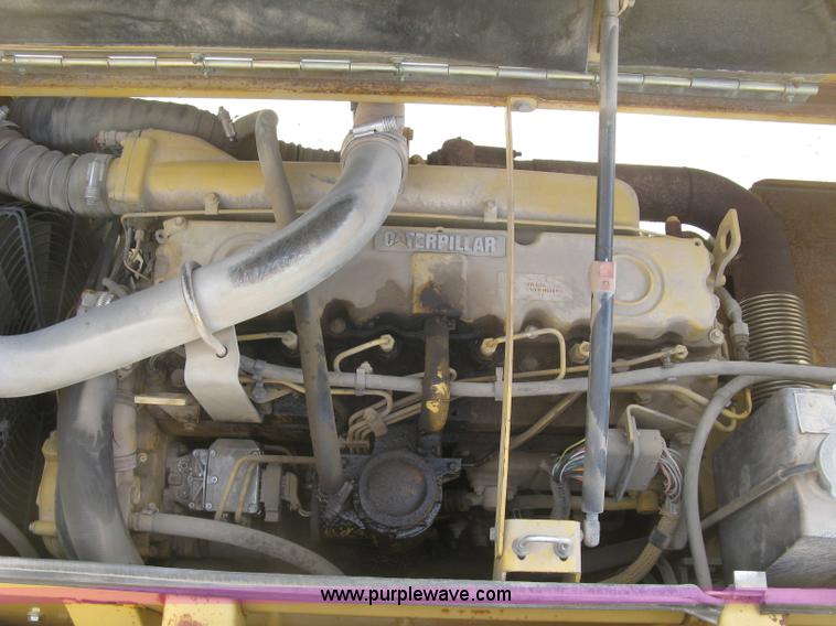 image for item J2903 Caterpillar M318C rubber tire excavator