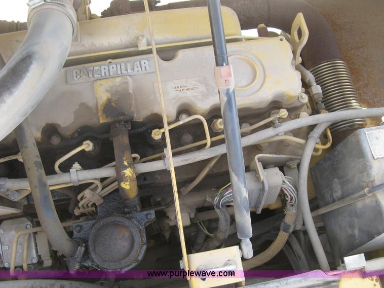 image for item J2903 Caterpillar M318C rubber tire excavator