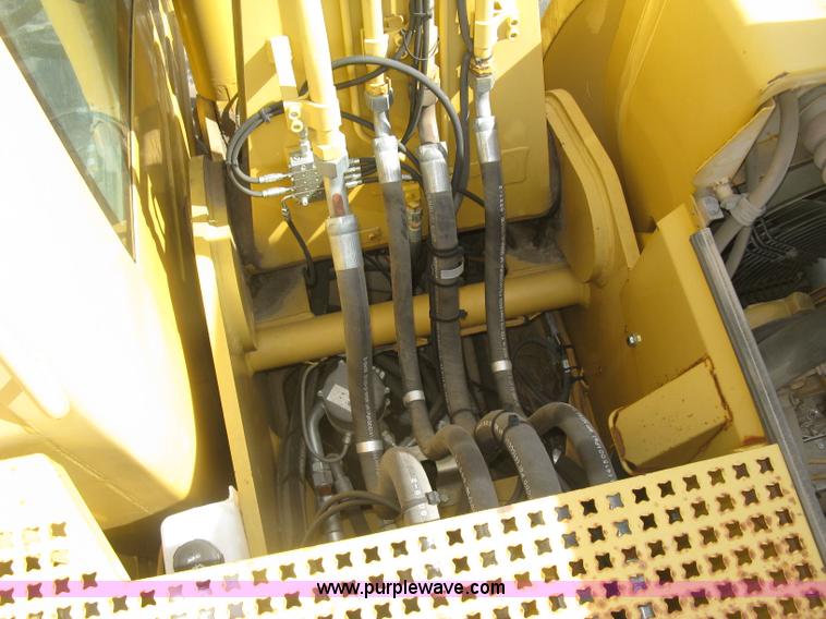 image for item J2903 Caterpillar M318C rubber tire excavator