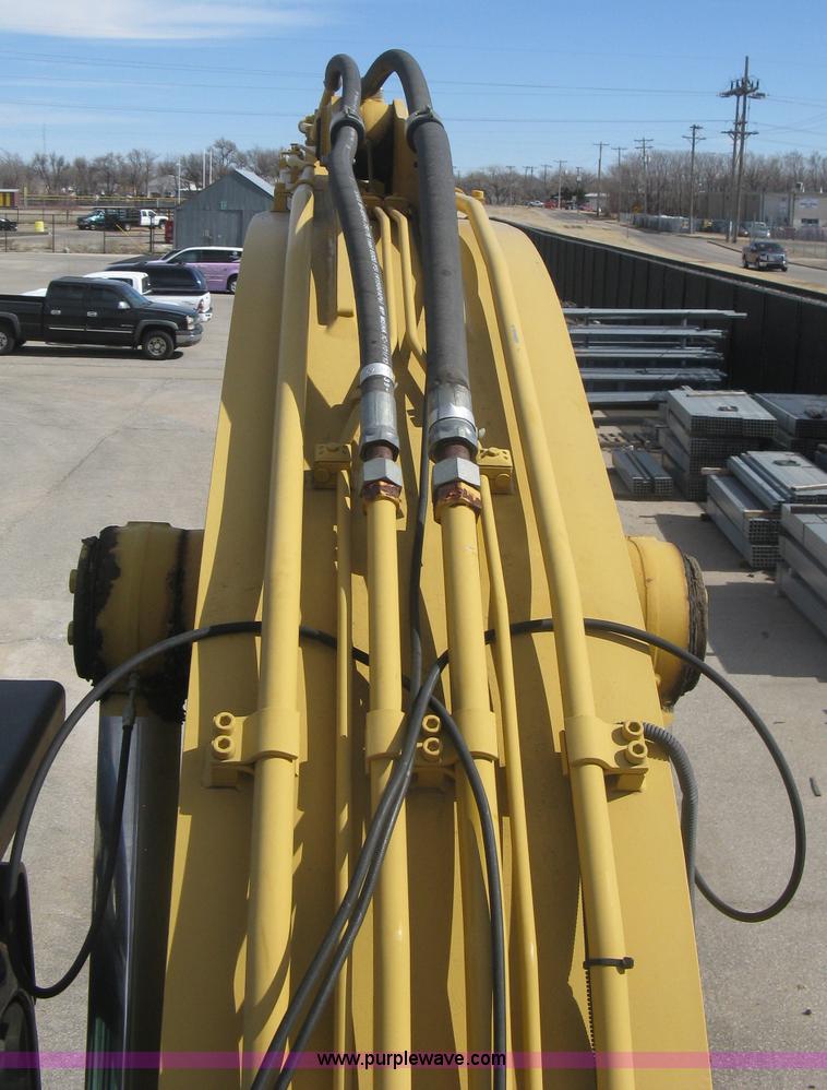 image for item J2903 Caterpillar M318C rubber tire excavator