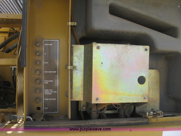 image for item J2903 Caterpillar M318C rubber tire excavator