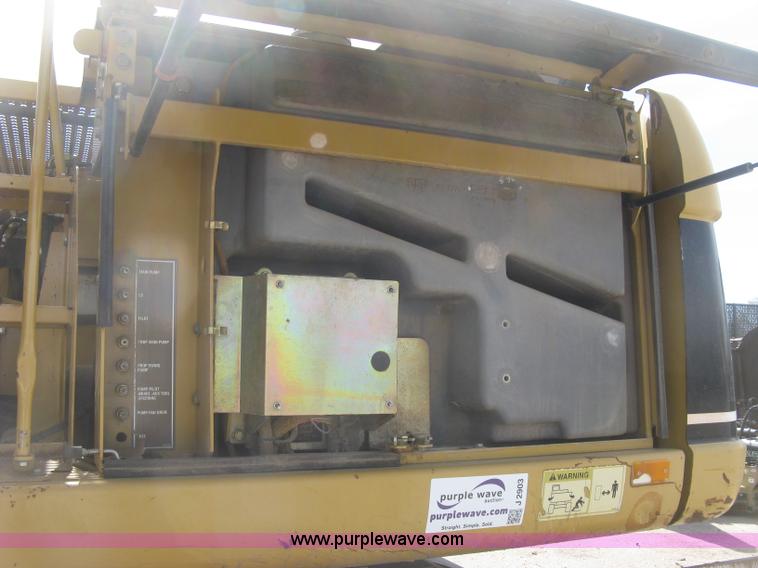 image for item J2903 Caterpillar M318C rubber tire excavator