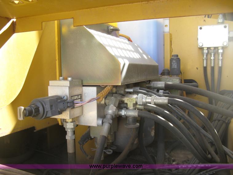 image for item J2903 Caterpillar M318C rubber tire excavator