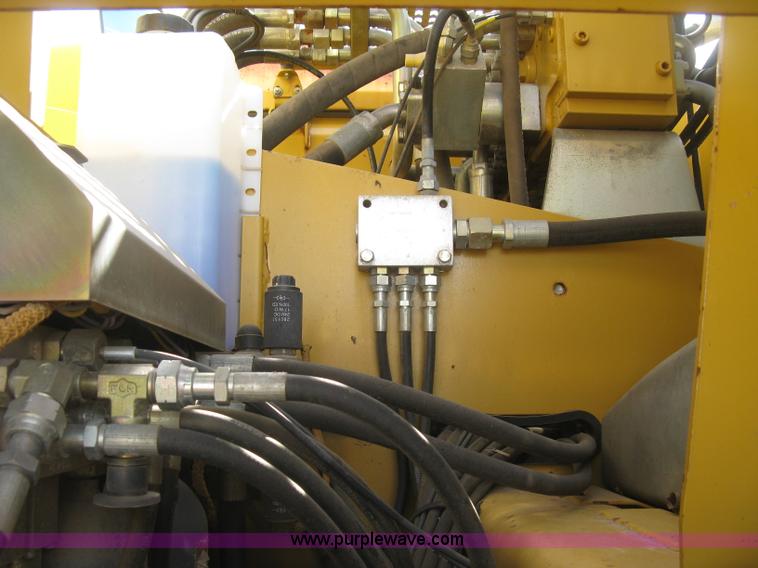 image for item J2903 Caterpillar M318C rubber tire excavator