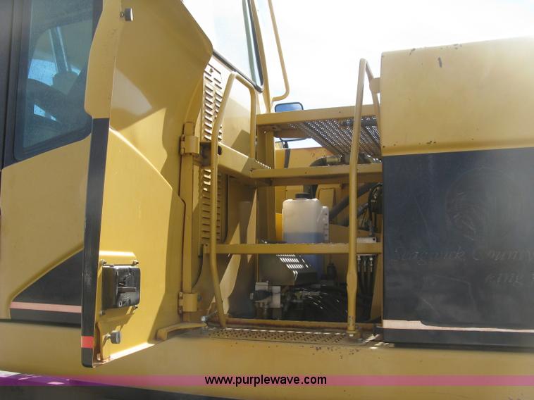 image for item J2903 Caterpillar M318C rubber tire excavator