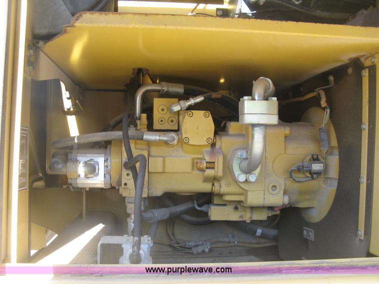 image for item J2903 Caterpillar M318C rubber tire excavator