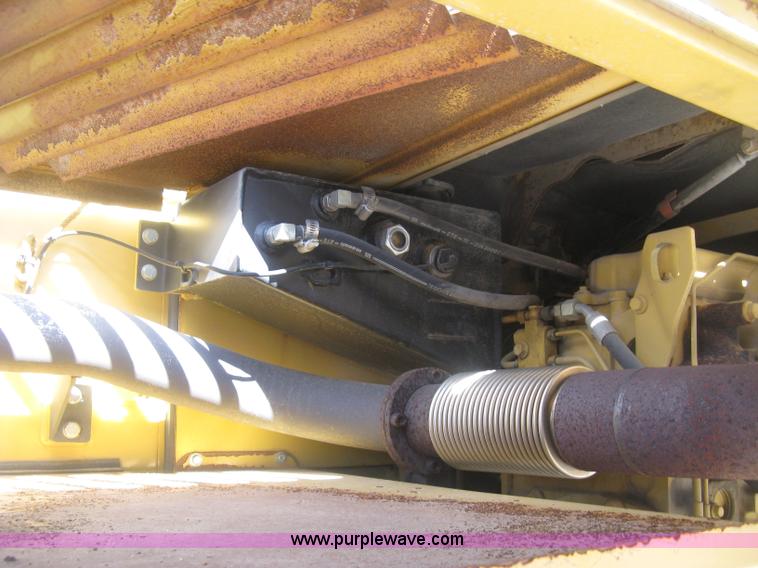 image for item J2903 Caterpillar M318C rubber tire excavator