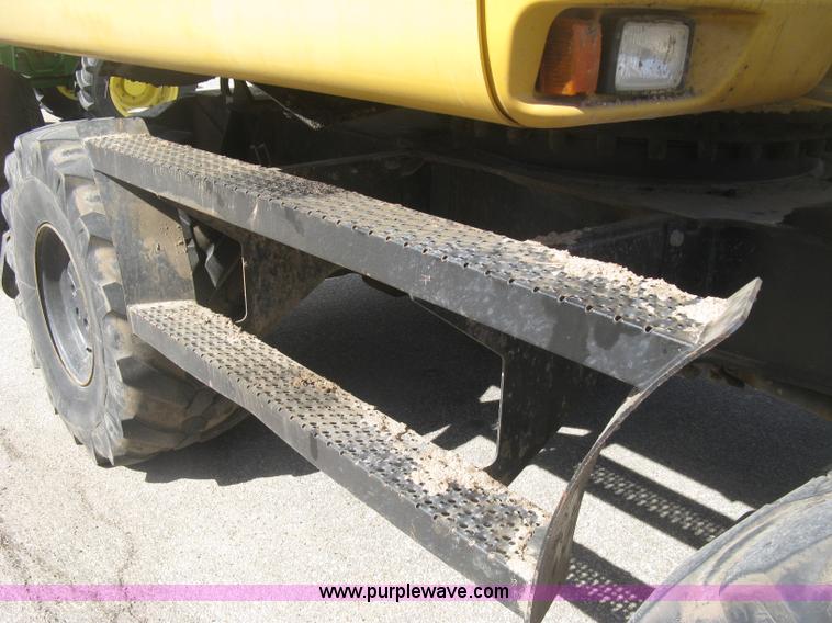 image for item J2903 Caterpillar M318C rubber tire excavator