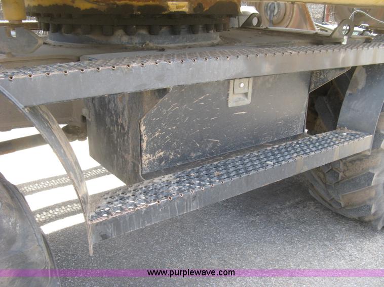 image for item J2903 Caterpillar M318C rubber tire excavator