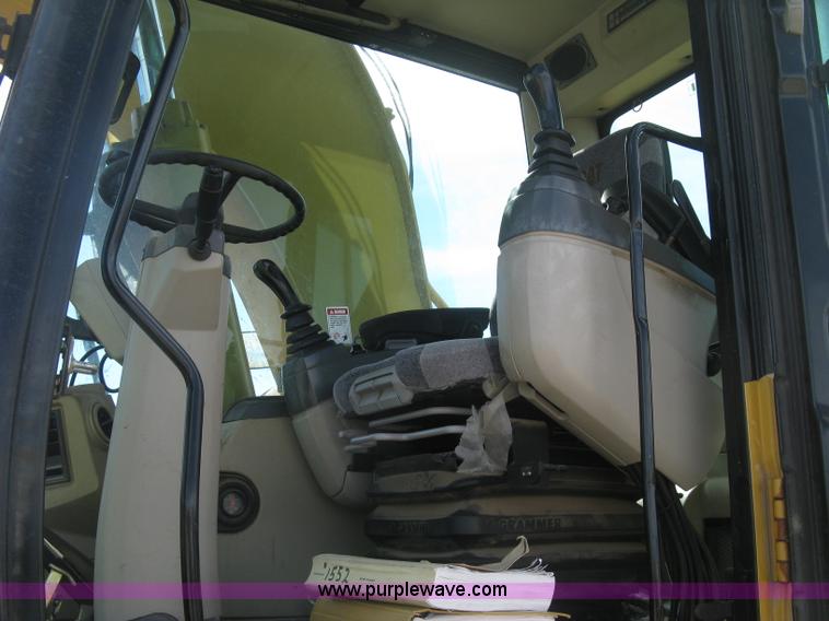 image for item J2903 Caterpillar M318C rubber tire excavator