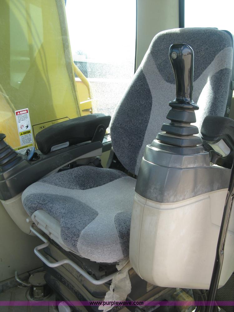 image for item J2903 Caterpillar M318C rubber tire excavator