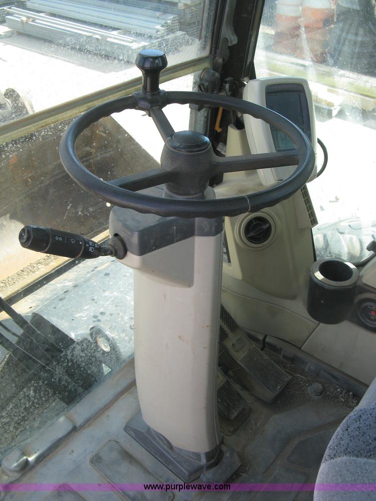 image for item J2903 Caterpillar M318C rubber tire excavator