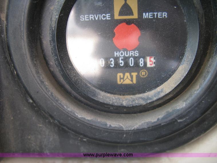 image for item J2903 Caterpillar M318C rubber tire excavator