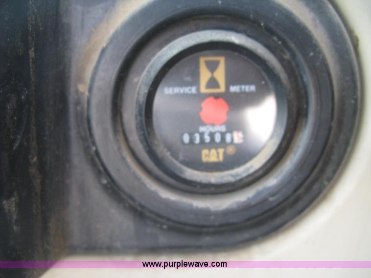 image for item J2903 Caterpillar M318C rubber tire excavator