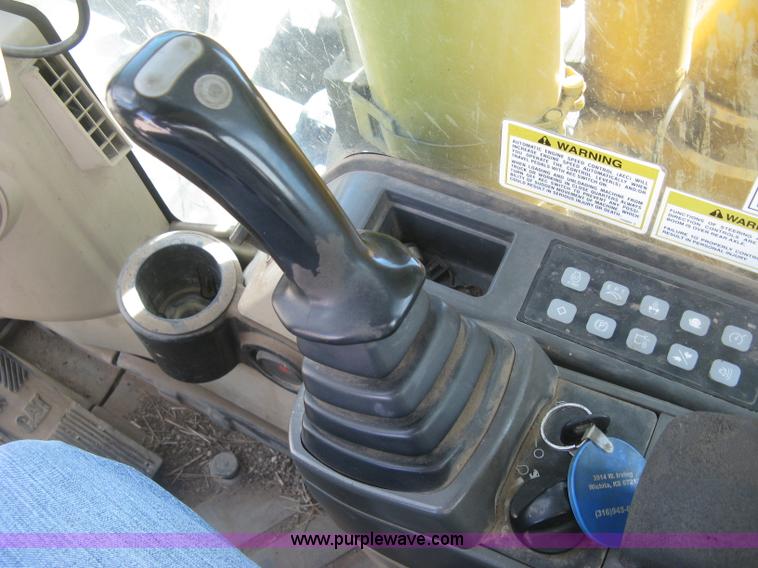 image for item J2903 Caterpillar M318C rubber tire excavator