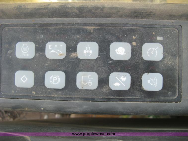 image for item J2903 Caterpillar M318C rubber tire excavator