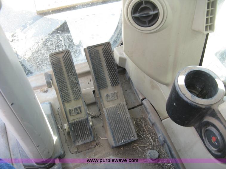 image for item J2903 Caterpillar M318C rubber tire excavator