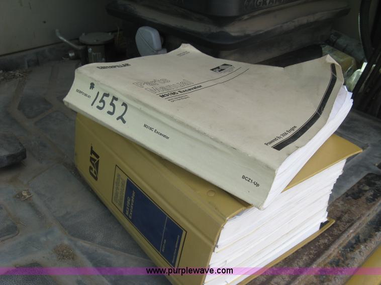 image for item J2903 Caterpillar M318C rubber tire excavator