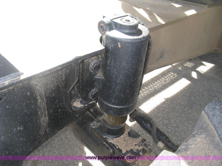 image for item J2903 Caterpillar M318C rubber tire excavator