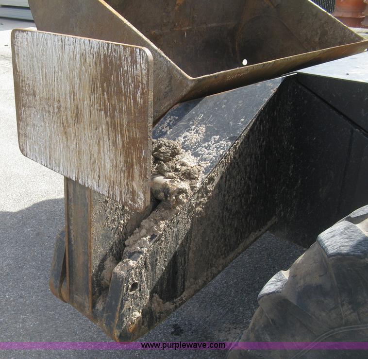 image for item J2903 Caterpillar M318C rubber tire excavator