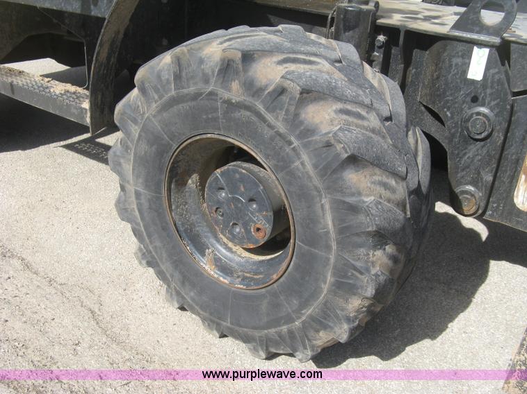 image for item J2903 Caterpillar M318C rubber tire excavator