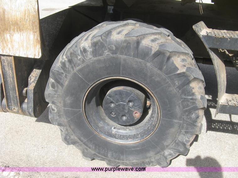 image for item J2903 Caterpillar M318C rubber tire excavator