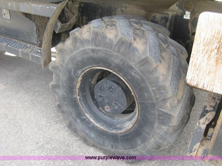 image for item J2903 Caterpillar M318C rubber tire excavator