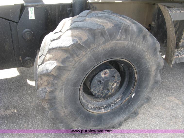 image for item J2903 Caterpillar M318C rubber tire excavator